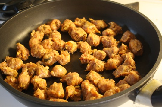 squeeze blobs of sausage meat out of casings