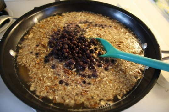 add water, syrup, nuts and fruit